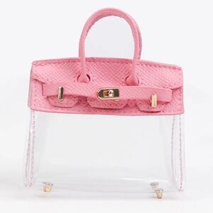 Super cute mini purse charm!